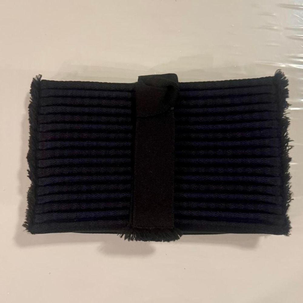 Rothy's Tassel Clutch